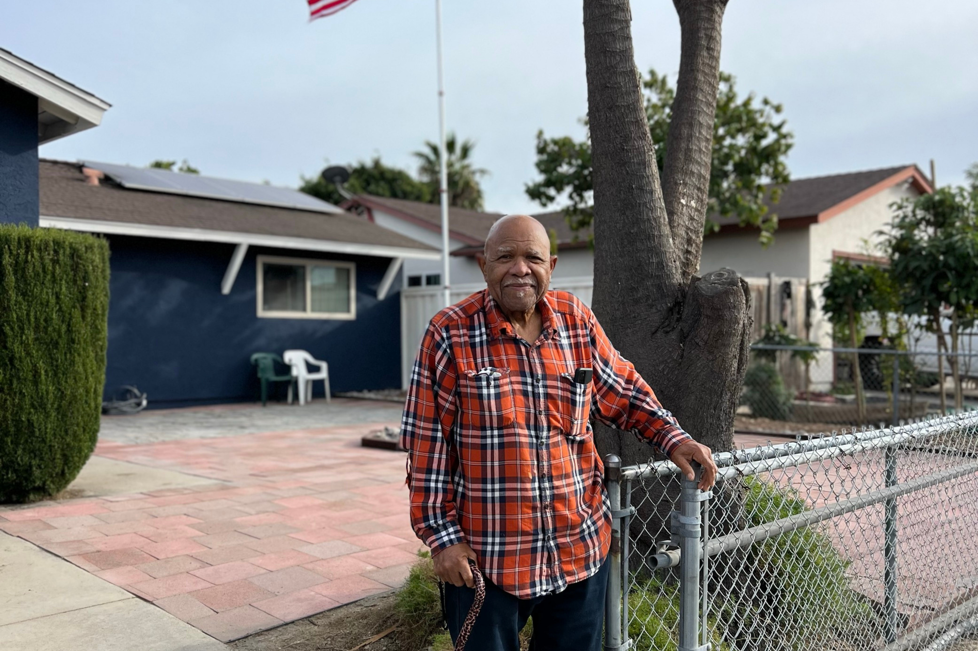 Stewart_Home Veterans Build 2024 - Stewart in front of his home